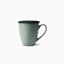 Tasse mit Sieb und Deckel